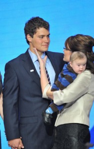 Levi and Mrs. Palin in a loving moment..